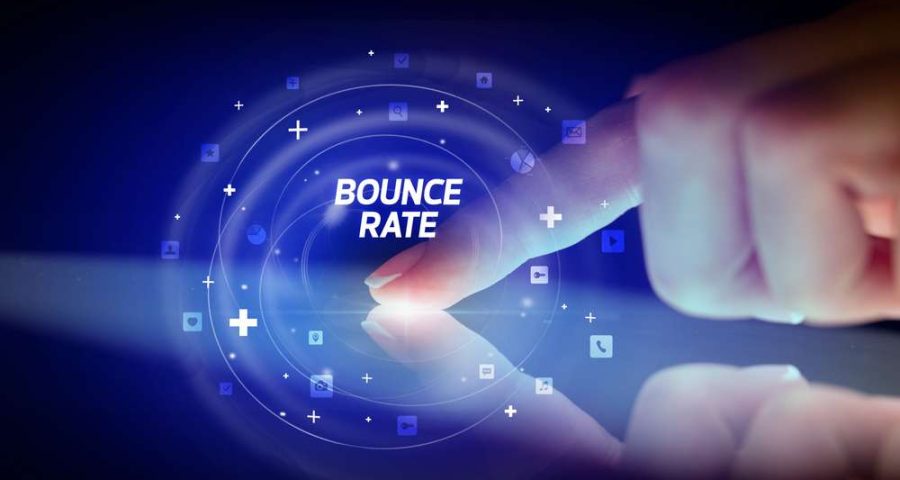 Finger,Touching,Tablet,With,Social,Media,Icons,And,Bounce,Rate