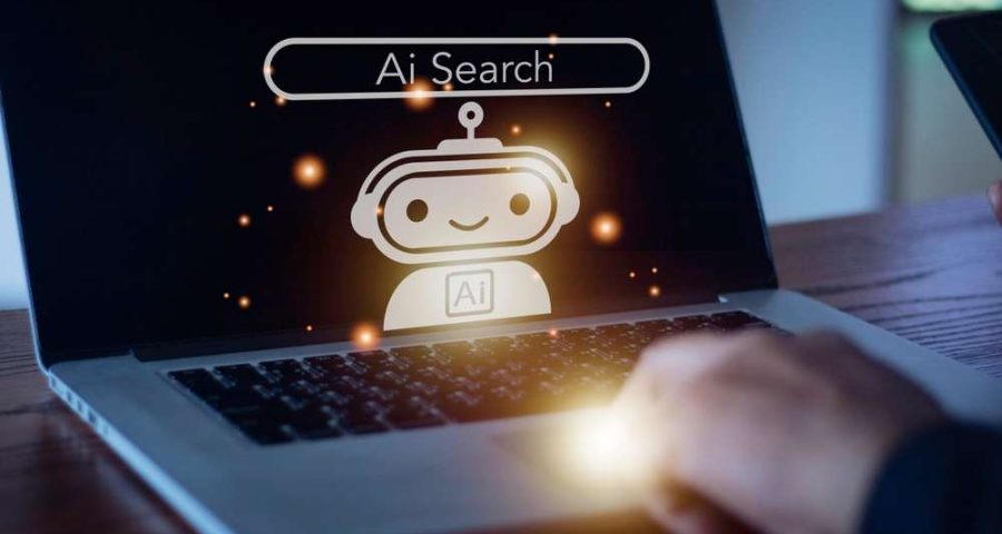 A person types on a computer with an AI search robot illustration displayed on the screen