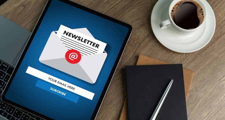 ipad with newsletter graphic