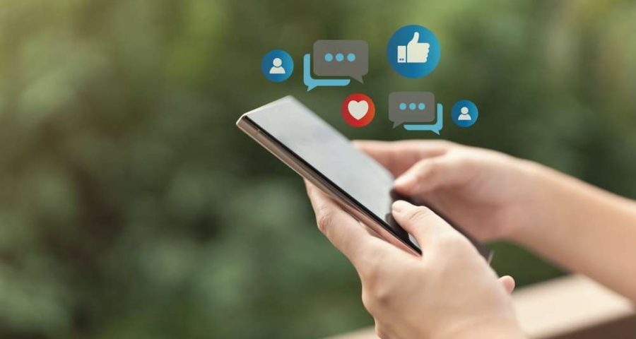Someone interacting with social media on their phone