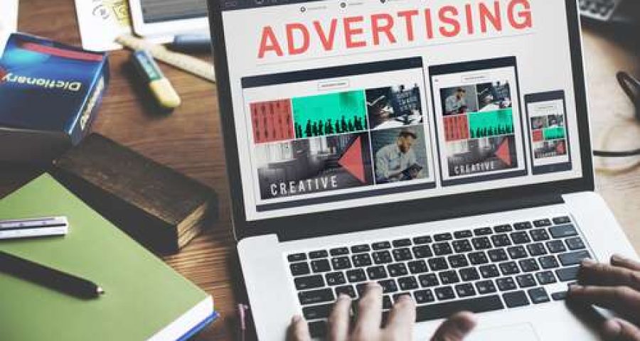 Computer displaying the word advertising to demonstrate online PPC methods