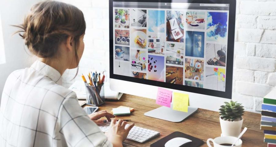 Woman looking at images on her computer
