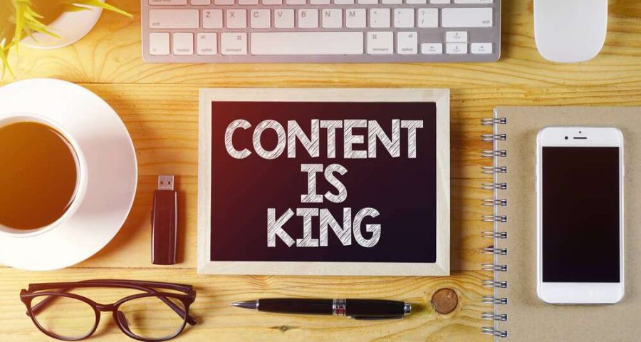Content is King content marketing concept on work desk